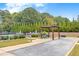 A community bocce ball court next to a landscaped pool area at 250 Cordova St, Woodstock, GA 30189