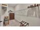 A spacious closet is shown with a carpeted floor, wire shelving, and a wooden dresser at 250 Cordova St, Woodstock, GA 30189