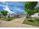 Beautifully landscaped front yard leads to this charming home with a two car garage and inviting curb appeal at 250 Cordova St, Woodstock, GA 30189