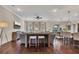 Open-concept living room features hardwood floors and recessed lighting at 250 Cordova St, Woodstock, GA 30189