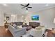 Spacious living room with hardwood floors and ample seating at 250 Cordova St, Woodstock, GA 30189