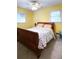 Bedroom featuring bright yellow walls, windows, ceiling fan and natural light at 4179 Westview St, Douglasville, GA 30135