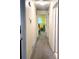 Hallway featuring neutral walls, carpet, and an open doorway to a bedroom at 4179 Westview St, Douglasville, GA 30135