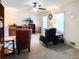 Open living room with carpet, large windows, and vintage furniture at 4179 Westview St, Douglasville, GA 30135