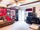 Living room featuring brick accents, a decorative fireplace, and an exterior door at 4179 Westview St, Douglasville, GA 30135