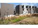 Modern townhome complex with sidewalks and a beautiful landscaped park at 456 Parkway Ne Dr # 10, Atlanta, GA 30308