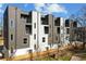 Striking townhome complex with private balconies and contemporary architectural details at 456 Parkway Ne Dr # 10, Atlanta, GA 30308