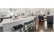 Modern kitchen with a large island, marble countertop, and stainless steel appliances at 456 Parkway Ne Dr # 10, Atlanta, GA 30308
