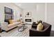 Cozy living room with stylish furnishings, an electric fireplace, and bright windows at 456 Parkway Ne Dr # 10, Atlanta, GA 30308