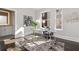 Bright home office features modern desk, stylish decor, and a view to the en suite bathroom at 456 Parkway Ne Dr # 10, Atlanta, GA 30308