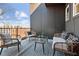 Cozy outdoor patio area with stylish furniture and a decorative rug at 456 Parkway Ne Dr # 10, Atlanta, GA 30308