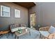 Relaxing patio with modern furniture, stylish cushions and a textured rug at 456 Parkway Ne Dr # 10, Atlanta, GA 30308