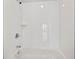 Clean, tiled shower featuring a shower head and inset storage niche at 456 Parkway Ne Dr # 10, Atlanta, GA 30308