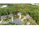 An aerial view of the home and its surrounding lush landscape at 1360 Woodvine Way, Alpharetta, GA 30005