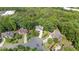 Aerial view of the property showcasing wooded land around the home at 1360 Woodvine Way, Alpharetta, GA 30005