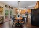 Eat-in kitchen featuring stainless appliances, granite countertops and breakfast bar at 1360 Woodvine Way, Alpharetta, GA 30005