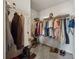 Organized walk-in closet with ample storage space and shelving for clothes, shoes, and accessories at 200 Valley Xing, Canton, GA 30114