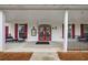 Welcoming clubhouse entrance with double doors, covered porch, and comfortable seating at 200 Valley Xing, Canton, GA 30114