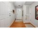Bright entry featuring hardwood floors and closet space at 200 Valley Xing, Canton, GA 30114