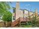 View of the back of the house and deck with stairs from the backyard at 200 Valley Xing, Canton, GA 30114