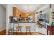 Well-lit kitchen with a breakfast bar, stainless steel appliances, and ample cabinet space at 200 Valley Xing, Canton, GA 30114