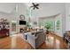Inviting living space with vaulted ceilings, fireplace, and access to the kitchen at 200 Valley Xing, Canton, GA 30114