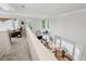 Spacious loft area overlooking the inviting living room with abundant natural light at 200 Valley Xing, Canton, GA 30114