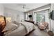 Spacious main bedroom features a large bed, sitting area, and ample natural light from a large window at 200 Valley Xing, Canton, GA 30114