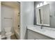 Bathroom featuring modern vanity with marble countertop, hexagon tile flooring, and shower-tub combo at 2118 Town Manor Ct, Dacula, GA 30019