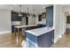 Kitchen with an island, modern cabinetry, and stainless steel appliances at 2118 Town Manor Ct, Dacula, GA 30019