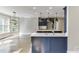 Kitchen view with an island, stylish pendant lights, and sink at 2118 Town Manor Ct, Dacula, GA 30019