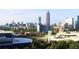 Expansive city view showcasing the skyline, lush greenery, and modern architecture at 250 Park Avenue West # 802, Atlanta, GA 30313