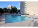 A refreshing outdoor pool with lounge chairs available for residents, perfect for relaxation at 250 Park Avenue West # 802, Atlanta, GA 30313