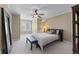 Bedroom with neutral tones and a ceiling fan at 9325 Saint Georgen Cmn, Duluth, GA 30097