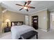 Bedroom featuring neutral tones and a ceiling fan at 9325 Saint Georgen Cmn, Duluth, GA 30097