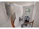 Grand foyer featuring a staircase, chandelier, transom window, and decorative front door at 9325 Saint Georgen Cmn, Duluth, GA 30097