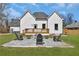 Expansive backyard featuring a patio area, fire pit, and comfortable seating to enjoy the yard at 1774 Vesta Ave, Atlanta, GA 30337