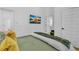 Comfortable bedroom with hardwood floors, ensuite bathroom, and natural light at 1774 Vesta Ave, Atlanta, GA 30337