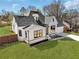 Charming home with a well-manicured lawn and a newly installed horizontal fence at 1774 Vesta Ave, Atlanta, GA 30337
