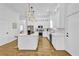Modern kitchen featuring a center island, stainless steel appliances, and ample cabinet space at 1774 Vesta Ave, Atlanta, GA 30337