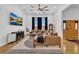 Cozy living room featuring stylish decor, hardwood floors, and abundant natural light at 1774 Vesta Ave, Atlanta, GA 30337