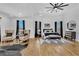 Spacious main bedroom with hardwood floors, contemporary decor and comfortable seating at 1774 Vesta Ave, Atlanta, GA 30337