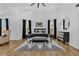 Well-appointed main bedroom boasting large windows, neutral walls, and modern decor at 1774 Vesta Ave, Atlanta, GA 30337