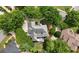 Aerial view showcasing a beautiful home with lush landscaping, a deck, and a well-maintained roof at 2743 Long Grove Dr, Marietta, GA 30062