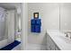 Bathroom features a white vanity, sink, mirror and blue towels in the decor at 2743 Long Grove Dr, Marietta, GA 30062