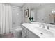 Cozy bathroom featuring a shower-tub, toilet, white vanity, sink, and neutral decor at 2743 Long Grove Dr, Marietta, GA 30062