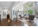 Elegant living room with high ceilings, fireplace, and large windows providing ample natural light at 2743 Long Grove Dr, Marietta, GA 30062