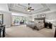 Spacious main bedroom with a sitting area and tray ceilings, creating a relaxing retreat at 2743 Long Grove Dr, Marietta, GA 30062