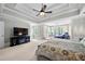Spacious main bedroom with a sitting area and tray ceilings, creating a relaxing retreat at 2743 Long Grove Dr, Marietta, GA 30062