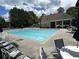 Large community pool with plenty of seating in a well-maintained recreation area at 4648 Glenshire Pl, Atlanta, GA 30338